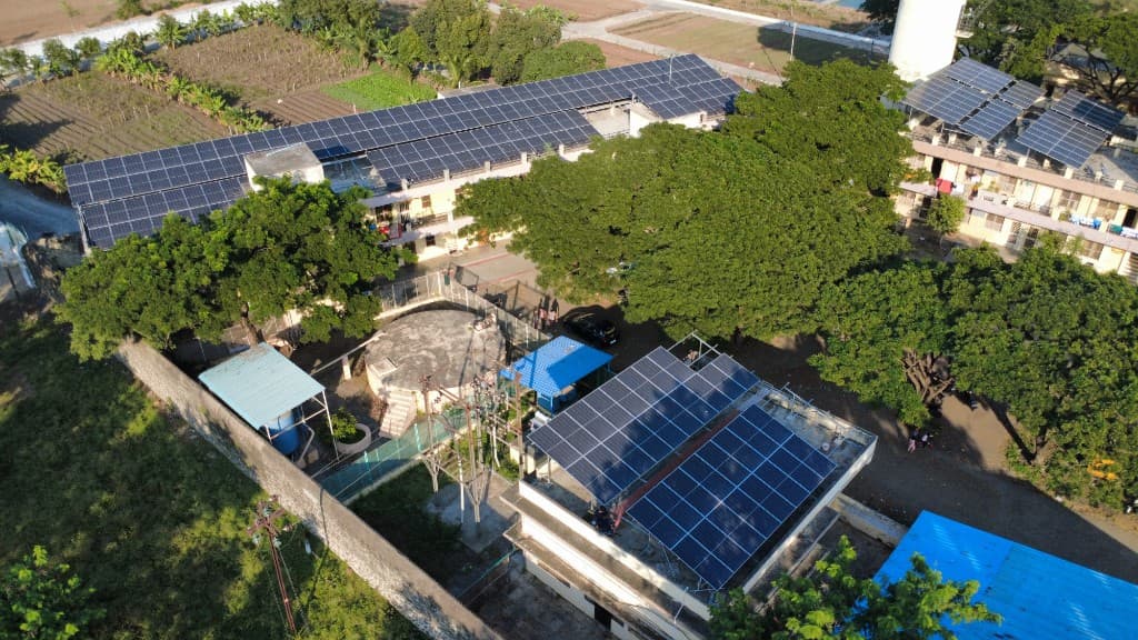 Rolling Energy rooftop solar installation — drone photograph